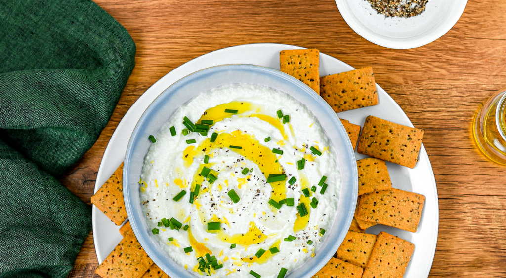 Whipped Lemon Garlic Ricotta Dip served with Mary’s Organic Crackers Olive Oil & Black Pepper REAL THIN Crackers.